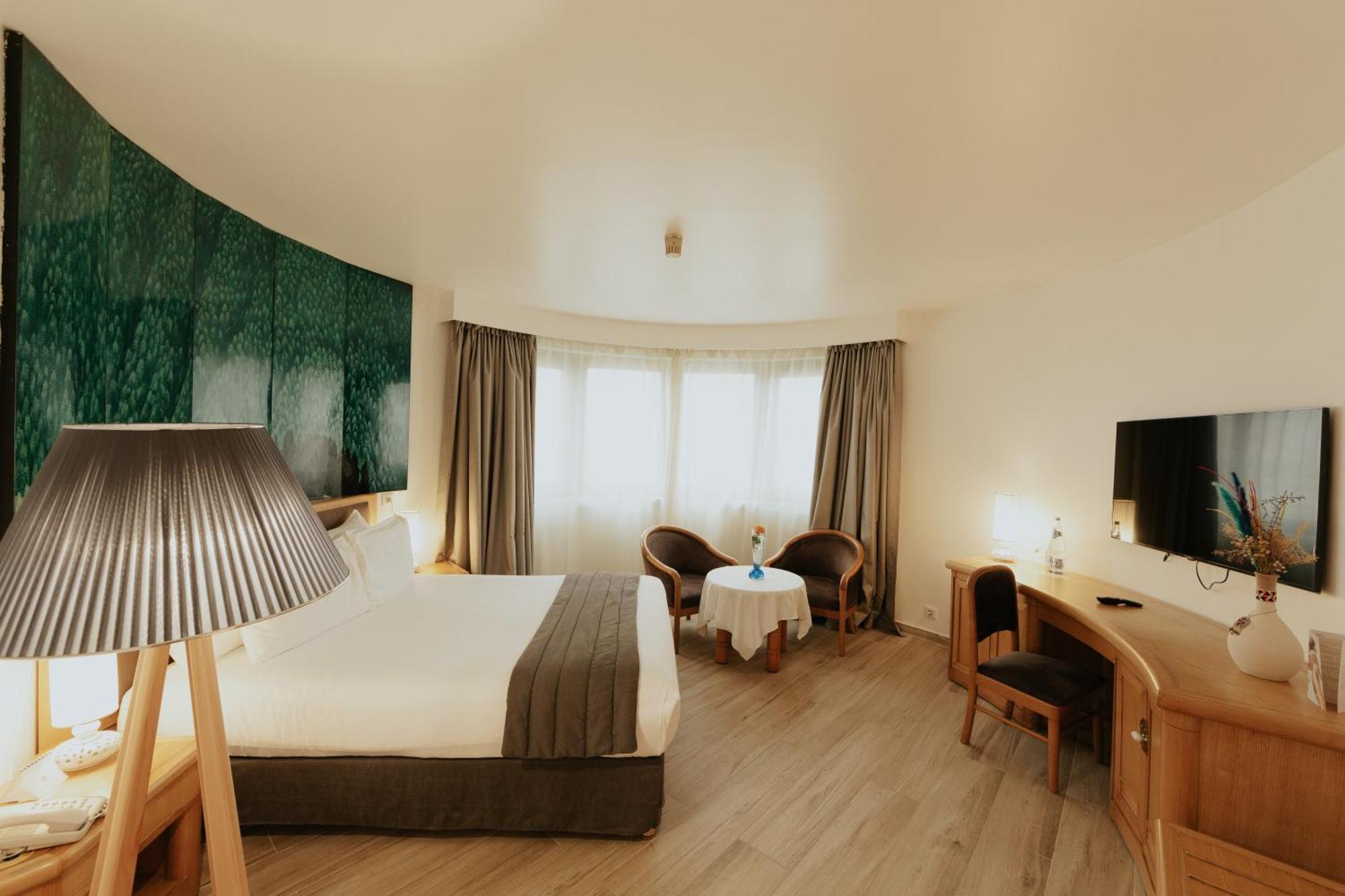 Hotel Mercure Alger Aeroport Dar el Beïda Eksteriør bilde A room at the hotel